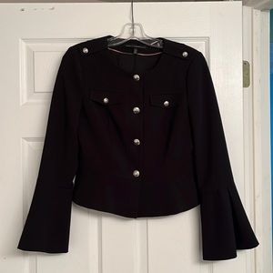 Black fitted short blazer with silver buttons. Great fit. Never been worn.